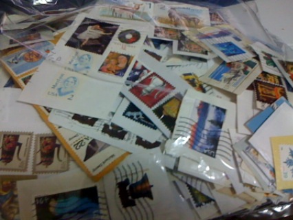 (対象画像) 使用済み切手 　アメリカ・カナダ　 台紙付　約５０枚分